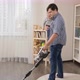 Father doing housework and cleanup with his little baby - VideoHive Item for Sale