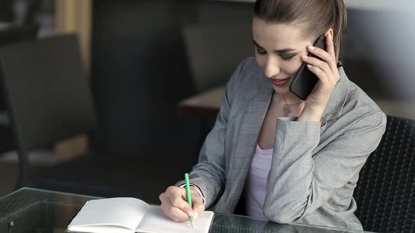 Young Business Woman with Phone Business People