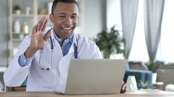 Online Video Chat by African-American Doctor