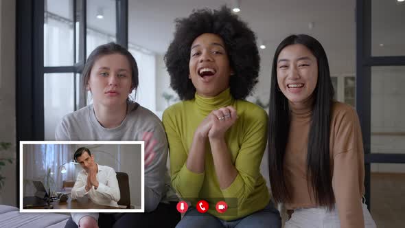 Confident Man Clapping in Video Chat As Multiethnic Women Rejoicing Business Startup Success Smiling