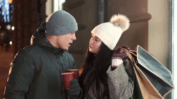 Two Loving People Pair with Hot Beverage in Hands Spending Xmas Evening Together