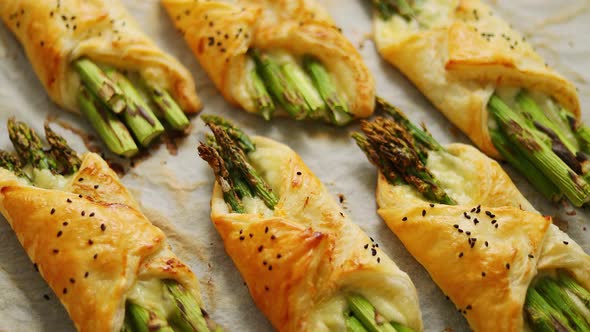 Baked Green Asparagus in Puff Pastry Sprinkled with Sesame Seeds