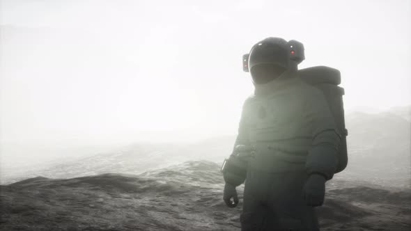 Astronaut on Another Planet with Dust and Fog