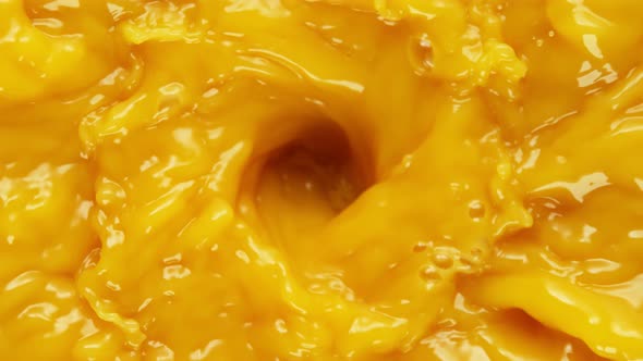 Super Slow Motion Shot of Orange Juice Vortex at 1000 Fps