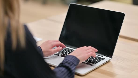 Hands of Woman Typing on Laptop