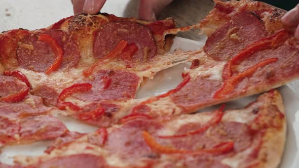 Closeup of Sliced Pepperoni Pizza