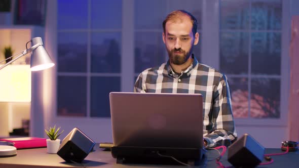 Happy Bearded Freelancer After Closing a Big Business Deal