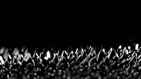 Super Slow Motion Macro Shot of Magnetic Liquid Ferrofluid in Motion at 1000Fps