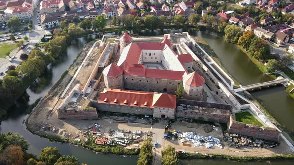 Aerial drone view of the Fagaras, Romania. Fagaras Citadel surrounded by a moat