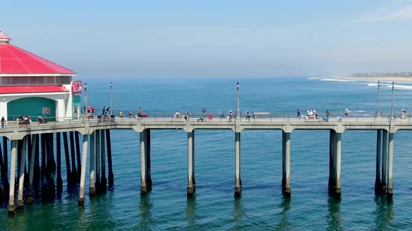 Aerial View of Huntington Pier, Beach and Coastline During Sunny Summer Day