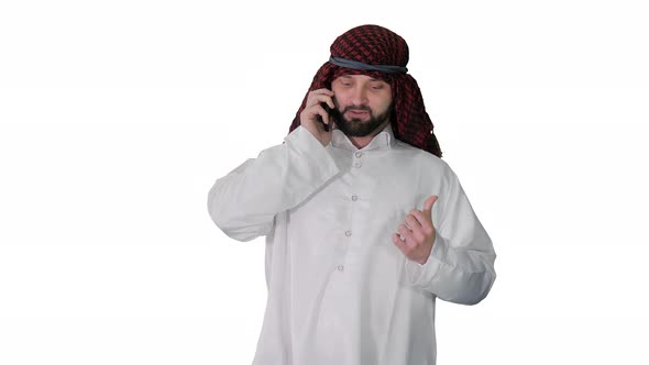 Arab Sheikh Making a Call Walking on White Background