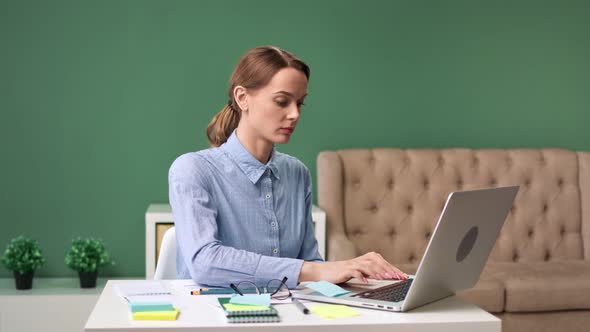 Confident Trendy Female Business Woman Working on Laptop