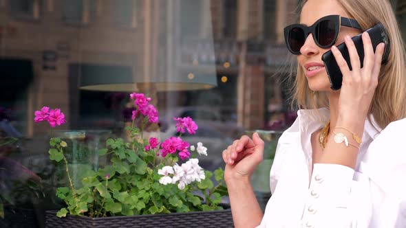 Beautiful Woman Talking on a Mobile Phone