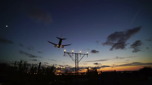 Airplane Arriving To Airport Terminal