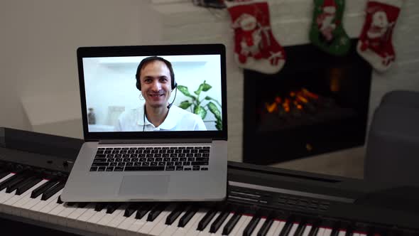 Christmas Time Laptop on Piano Keys