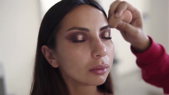 Closeup of Woman with Beautiful Eyes Evening Makeup