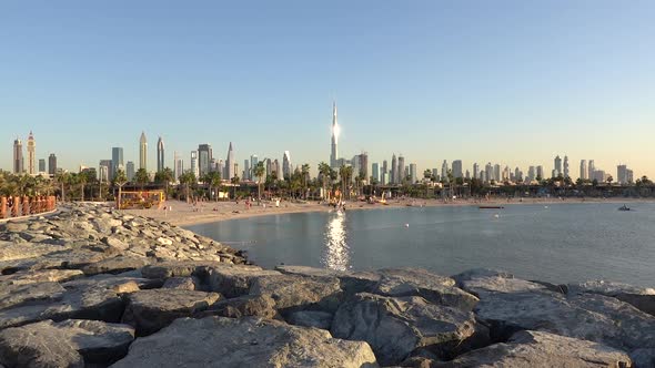 4K Dubai La Mer beach. Time lapse skyline with Burj Khalifa view.