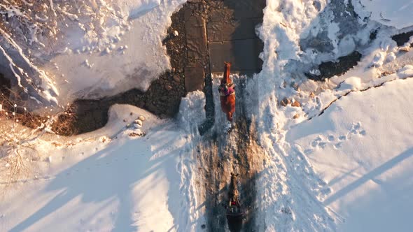 Horse ride in winter beautiful untouched landscape environment. Aerial top view