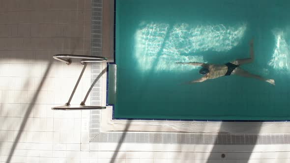 Woman swimmer in the pool