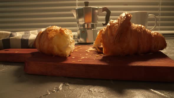 Food and Drink Concept. Morning Breakfast - Coffee and Croissant on a Table