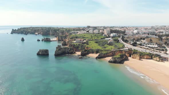 Wide view over Rugged Coastline of Lagos next do Batata Beach, Algarve, Portugal