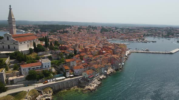 Aerial view of St. Euphemia church in Rovinj old town, Istria, Croatia. Aerial Drone View (Reveal) o