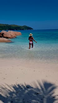 Anse Source d'Argent La Digue Seychelles Young Woman on a Tropical Beach During a Luxury Vacation in