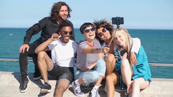 Happy Friends Posing for Selfie on Seafront