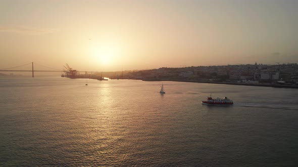 Aerial Sunset Landscape of the Tagus River in Lisbon Portugal