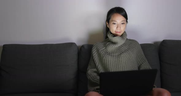 Woman use of laptop computer at home