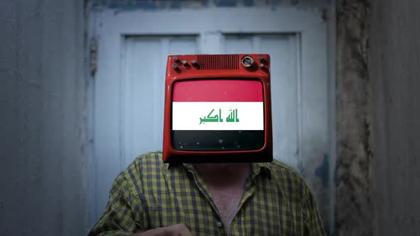 Man with Old TV instead of Head, showing the Flag of Iraq on Screen.