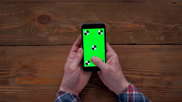 Hands Unrecognizable Person Typing in Smartphone with Green Screen