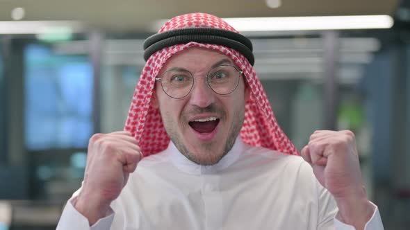 Successful Middle Aged Arab Man Celebrating