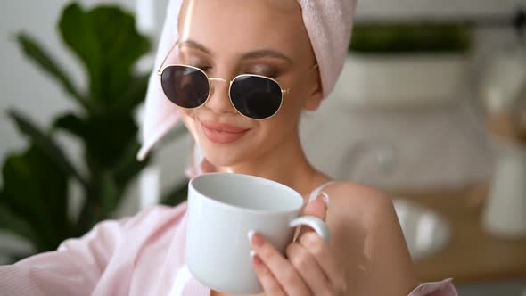 Beauty Girl with White Hair Looking at Camera at Home