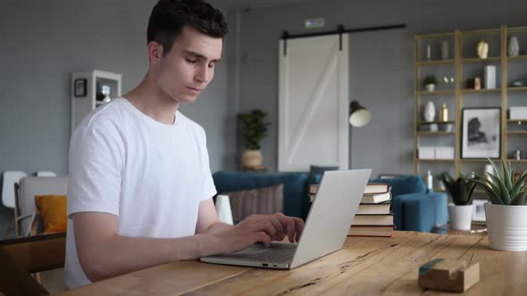 No Man Rejecting Offer By Waving Finger at Work