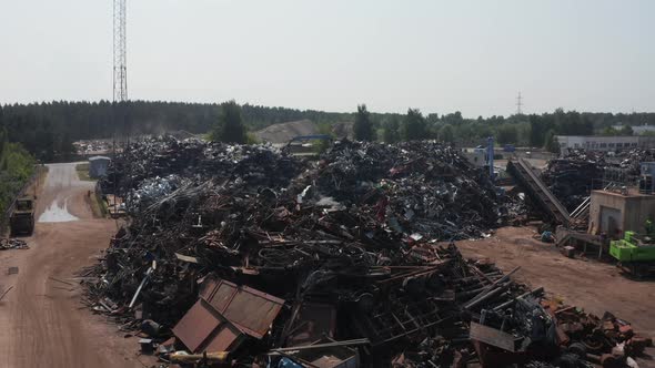 Old Wrecked Cars in Junkyard Waiting to Be Shredded in a Recycling Park