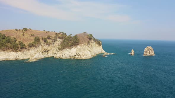 Kekura and Rocky Cape Telyakovsky Washed By the Sea of Japan on a Sunny Day