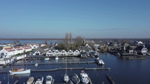 Loosdrechtse dike in the Netherlands between the lakes with marinas