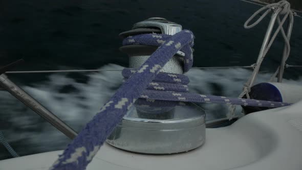 Close-Up of Steel Sailboat Winch With Rope