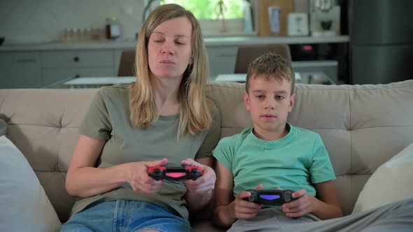 Boy Play Video Game with His Father