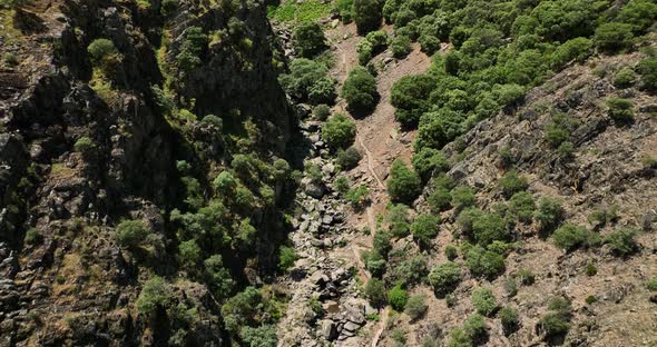 HE SPECTACULAR MEANCERA WATERFALL IN THE NORTH OF EXTREMADURA LANDSCAPED IN A NATURAL PLACEA WATERF