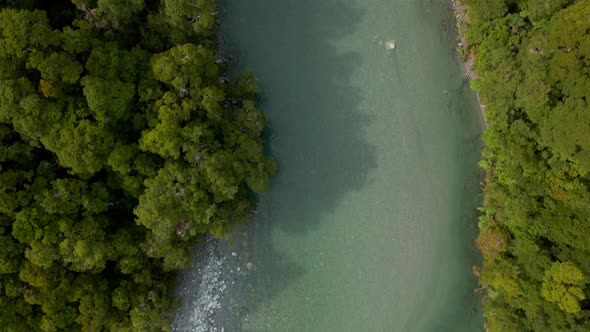 Overhead aerial view of clear green river in Blue Pools in New Zealand