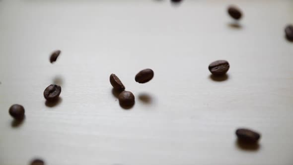 Coffee beams droped on desk captured on slow motion camera