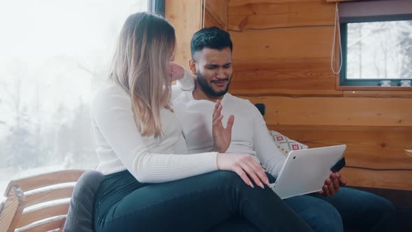 Young Couple Having an Argument While Shopping Online