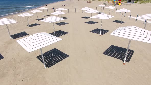 Aerial view of the beach umbrellas in summer