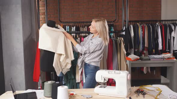 Young Dressmaker Creating a Garment