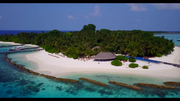 Aerial top down tourism of luxury island beach voyage by transparent lagoon and bright sand backgrou