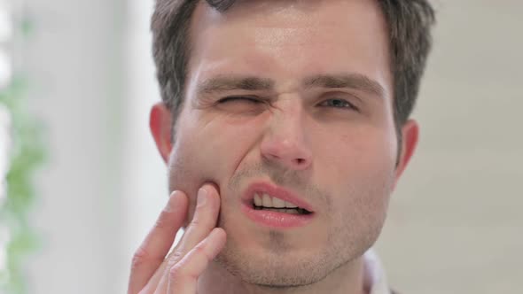 Close Up of Man Having Cavity Toothache