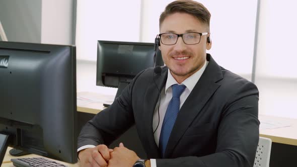 Business People Wearing Headset Working in Office