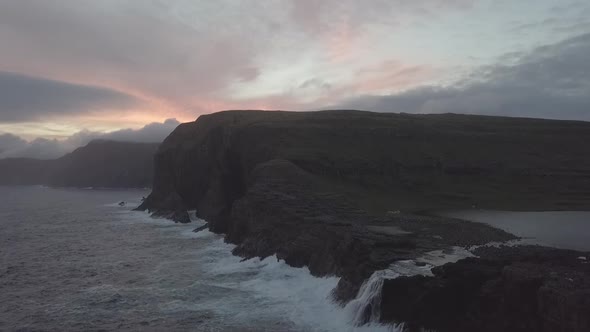 Aerial Drone Footage of Bøsdalafossur waterfall, Sørvágsvatn & Trælanípan,Vágar, Faroe Islands